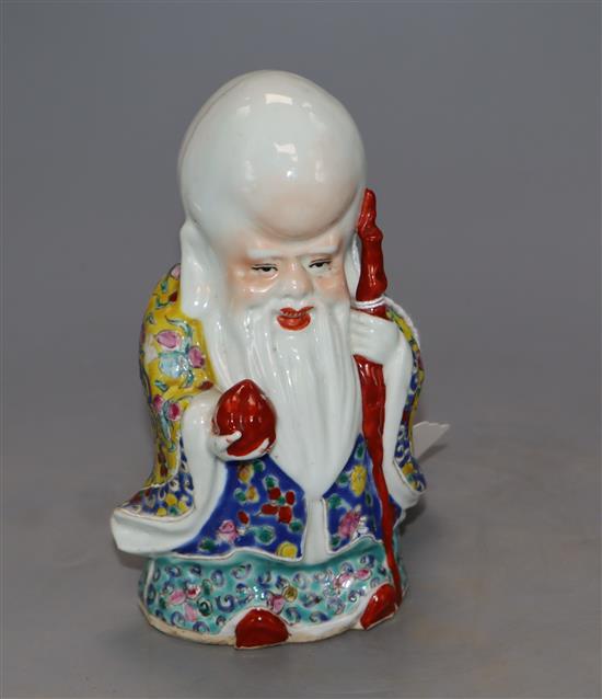 A Chinese famille rose figure of Shou Lao, height 15cm